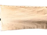 a large piece of cloth on a white surface