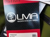 a tag that says uma on it next to a piece of luggage