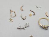 many different types of jewelry that are on the table