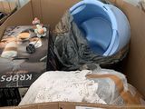 a cardboard box full of items that are in the box