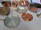 many pots and pans that are on the table