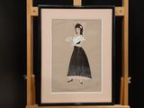 painting of a woman in a black dress holding a fan on a easel