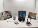 a table with headphones and a box on top of it