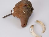 an animal head and a banana on a table