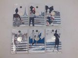 four magnets with different images of people on them on a white surface