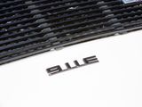 a close up of a car ' s emblem on the front of it