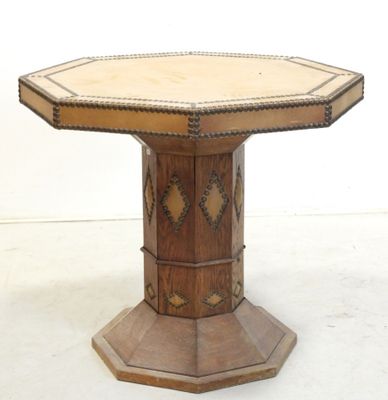 a wooden table with a wooden top and a wooden base
