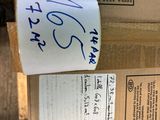a piece of paper on top of a cardboard box