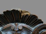 a close up of a sculpture of a man ' s face