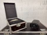 a suitcase that is sitting on top of a table