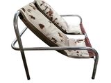 an image of a chair with a cow print cover on it