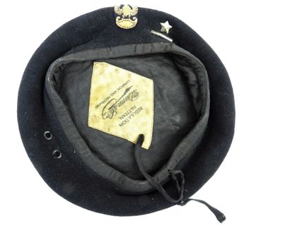une image représentant un chapeau noir orné d'une étoile dorée