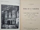 an open book with a picture of a building on it