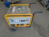 a small generator sitting on a cart in a garage