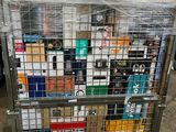a metal cart with many boxes of cigarettes on top of it