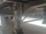 a close up view of a flatbed truck with a flat bed