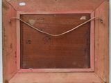 an old wooden picture frame with a rope hanging from it ' s side