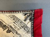 an image of a red and white pillow with a map on it