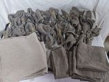 a lot of cloths that are sitting on a table