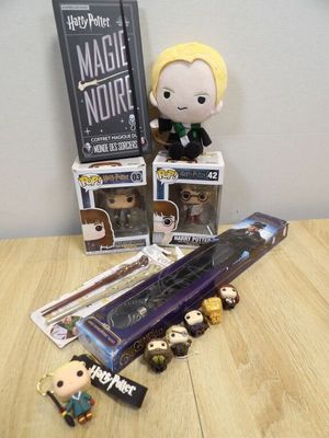 a table with a bunch of harry potter figurines on top of it
