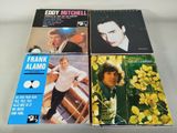 three cd ' s of various albums of the same music
