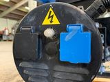 a picture of a machine that is sitting on a pallet