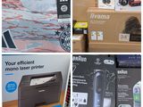 de nombreux modèles d'imprimantes exposés dans un magasin