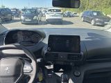 a view of a car ' s dashboard from inside a vehicle