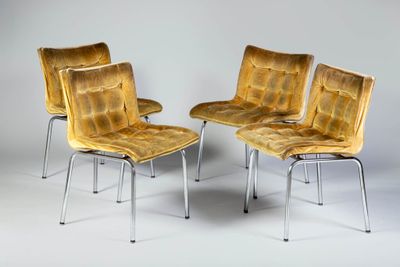 three yellow chairs sitting next to each other on a white surface