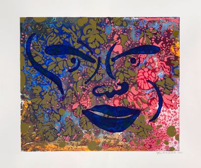 a picture of a painting of a face on a piece of paper