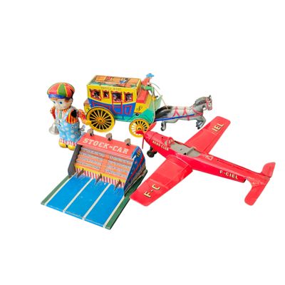 a small toy airplane and a toy train on a white background