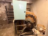an image of a room that has a large metal bucket in it