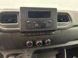 a dashboard of a car with a radio and a steering wheel