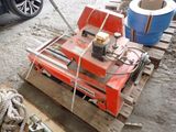 a small machine that is sitting on a pallet