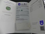 a book with a picture of a green diamond on it