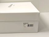 a white box that is open on a white surface