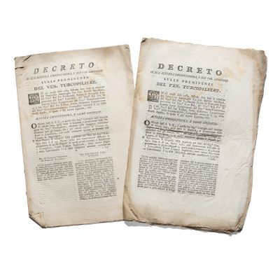 an old book with two pages that are open on top of each other