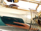 a close up view of a trumpet that is shiny and shiny