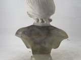 marble bust of a woman with a shell on her head