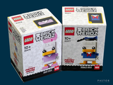 deux boîtes de Lego posées l'une à côté de l'autre