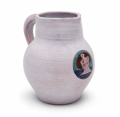 a white vase with a picture of a woman on it