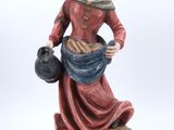 une image représentant une statue de femme tenant un pot