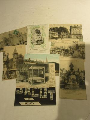 many old postcards that are on a table