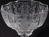 a glass bowl that is sitting on a table