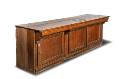 an image of a wooden cabinet with two doors on one side and a shelf on the other side