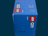 a blue box with a lego figure inside of it