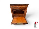 a small wooden desk with a drawer underneath it