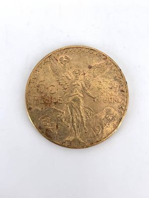 an image of a gold coin on a white surface