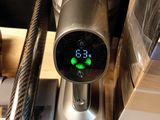 a digital clock that is on the side of a machine