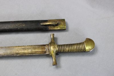 two knives that are sitting on a table